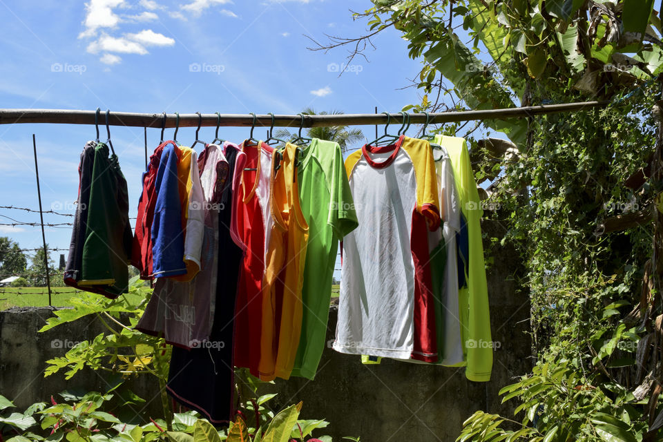 Clothes hanging on bamboo for drying