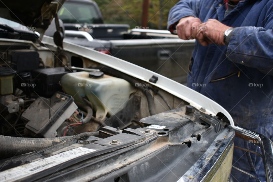 mechanic working on a truck
