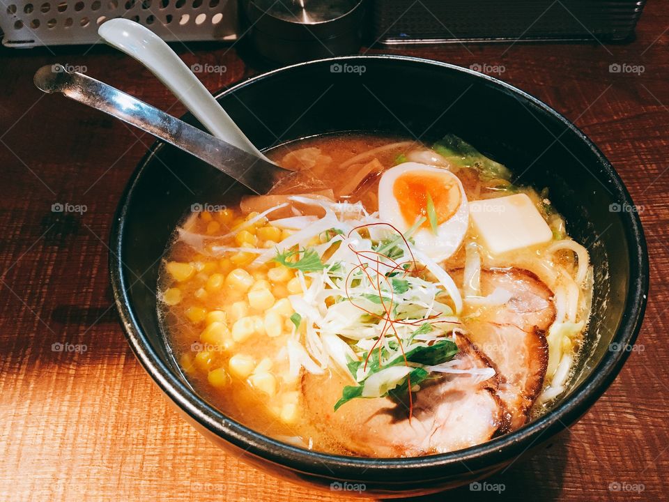 Butter and corn ramen from a store in Ramen Yokocho, Sapporo. There was an extra metal spoon with holes in the bottom to make it easier to fish out the corn. 
