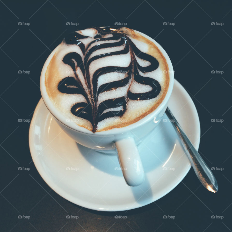 Cappuccino on dark background.  