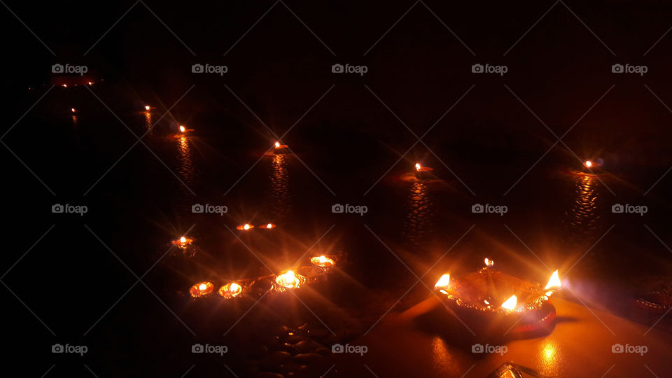 Lamp light, reflected on the floor in the season of festival of lights.