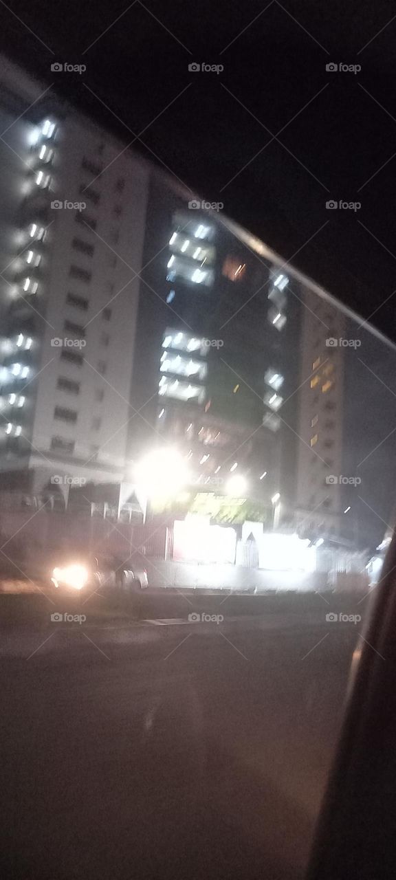 Twinkling windows , the beauty of evening light. Bask in the beauty of evening light with the view of light twinkling from these windows at night