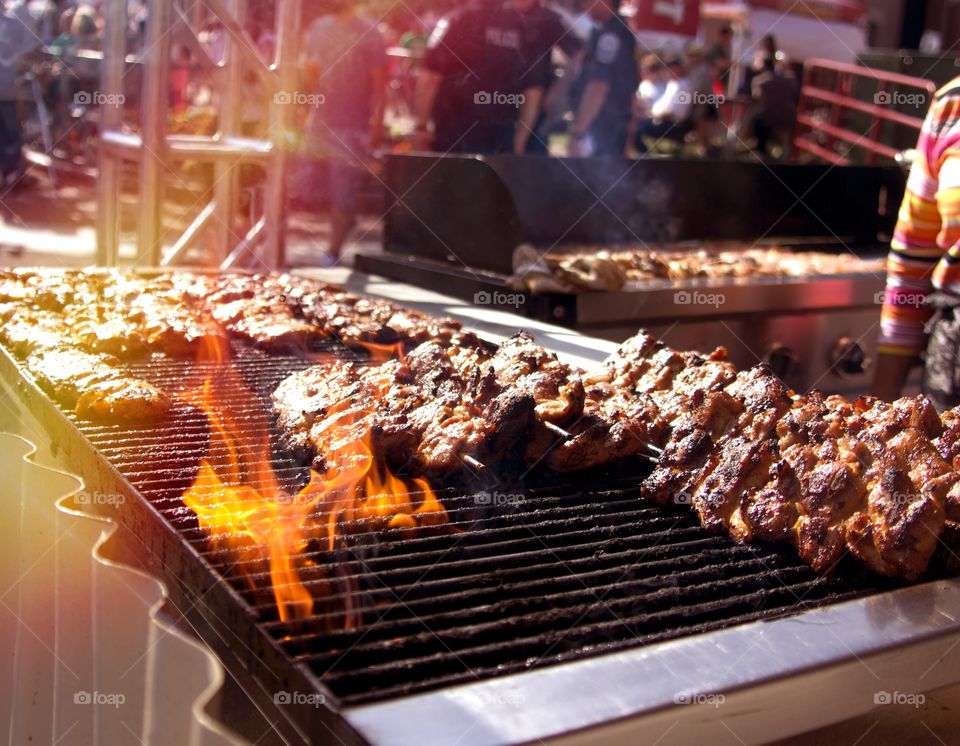 BBQ Fire. A 2 grill bbq at an event. More than enough for everyone!