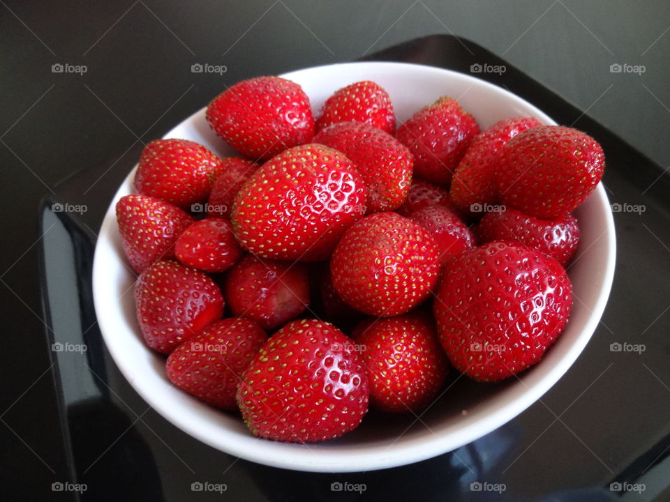 Strawberries on bowl