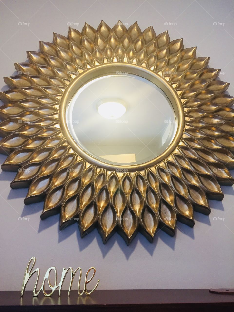 Gold mirror