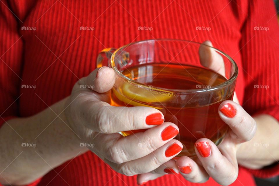 cup of tea in the hands autumn colours, healthy