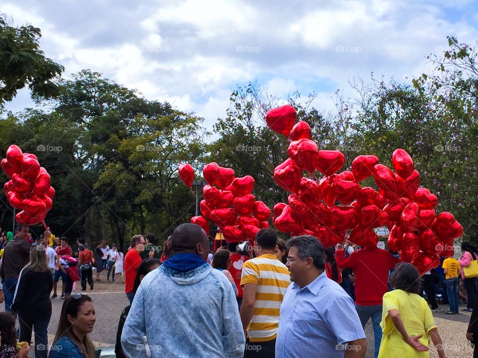 Red balloons in the park