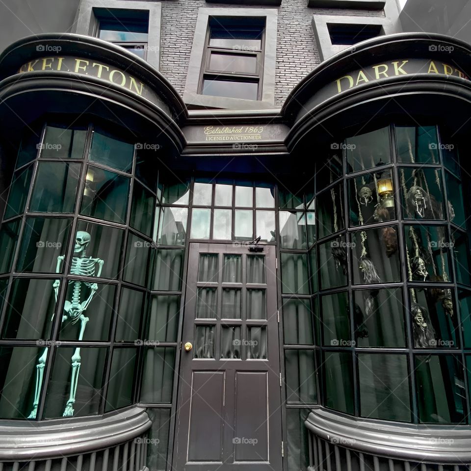 skeleton and crown in front of the bar in bangkok