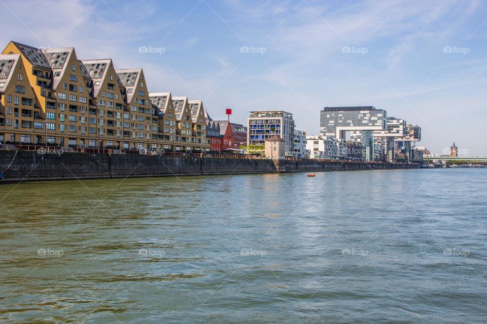 the Rhine River, the buildings and the Cityscape of Cologne or Koeln NRW Germany Europe