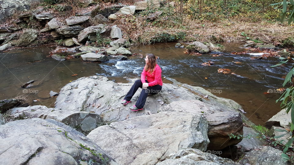 Beautiful wife on the rocks