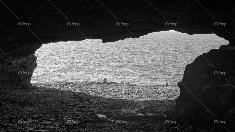 Hole in the rock by the sea