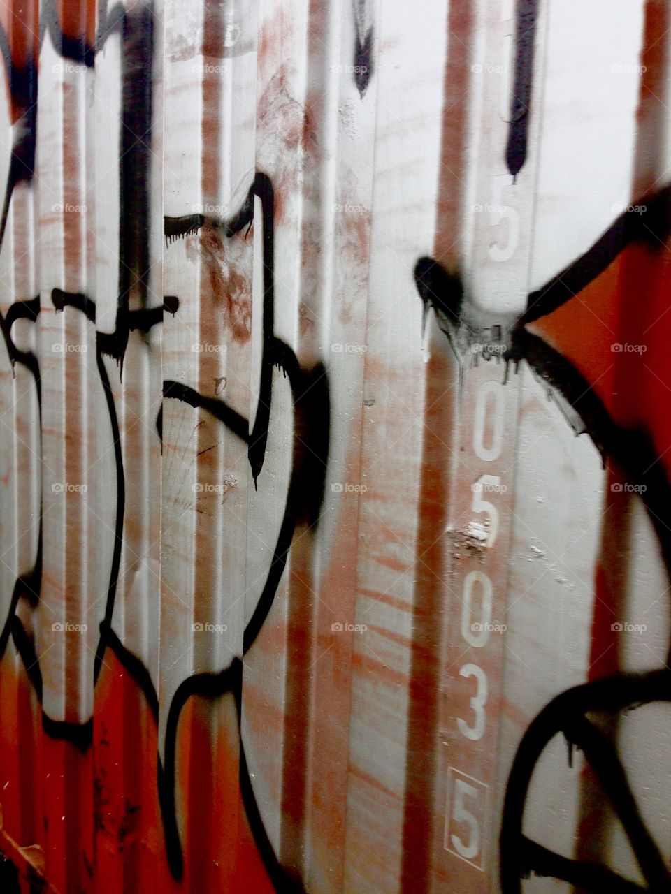 Grey paint on colour 