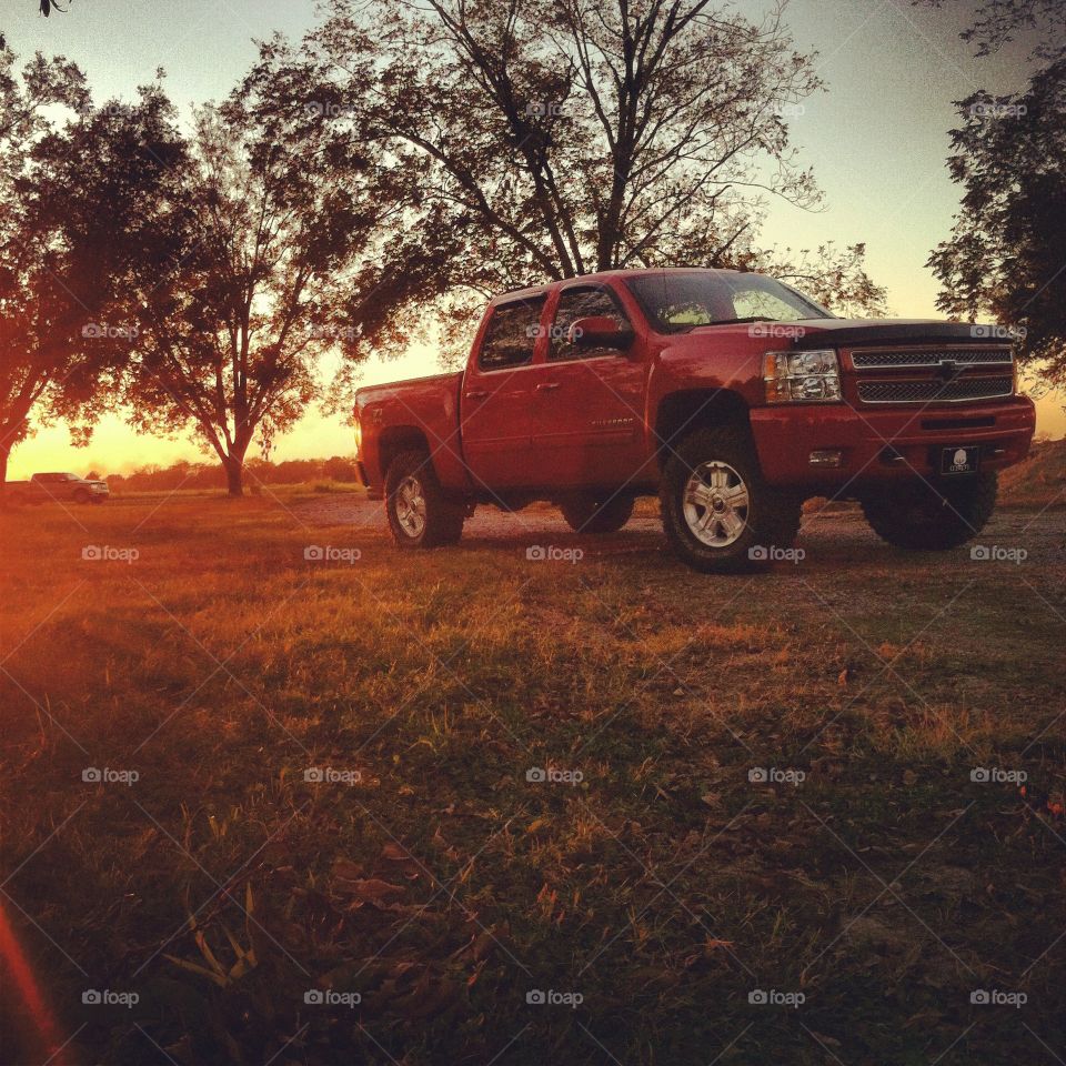 Red truck in the sunset 