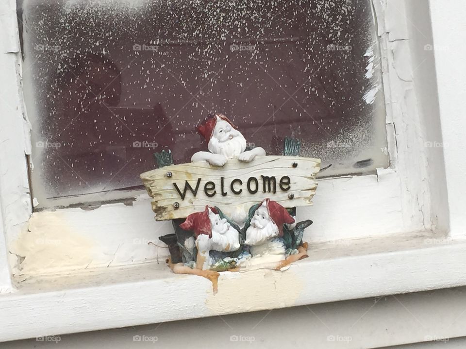 Welcoming Santa. Santa holding a welcome sign