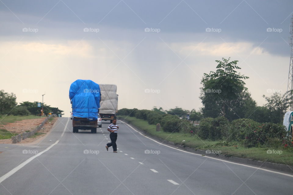passerby cloudy evening highway