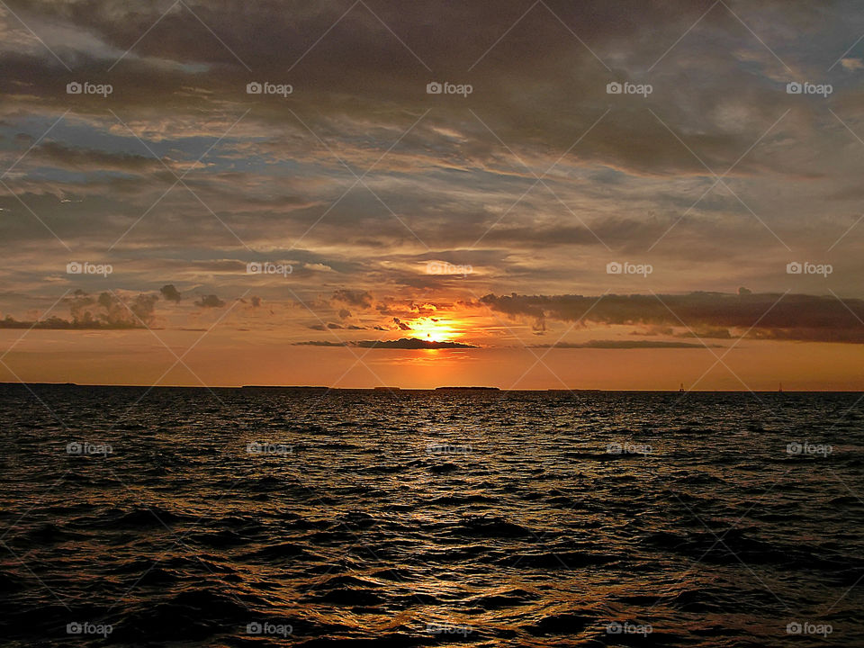 Sun Set Over Ocean Key West. Sun setting over the ocean in the Florida Keys Key West, Florida 