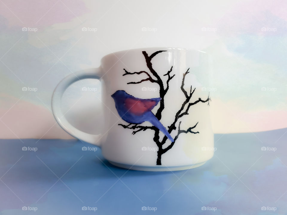 Favorite coffee mug- purple/ blue bird on black bare branches