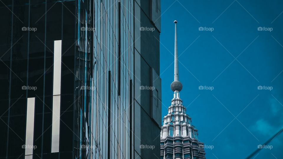 Modern skyscrapers against blue skies 