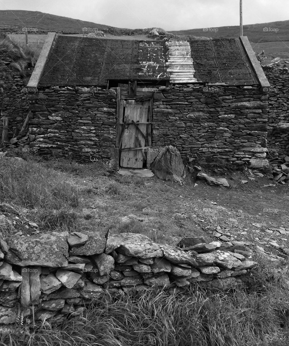Countryside. Black and white photo of an old house in the countryside.