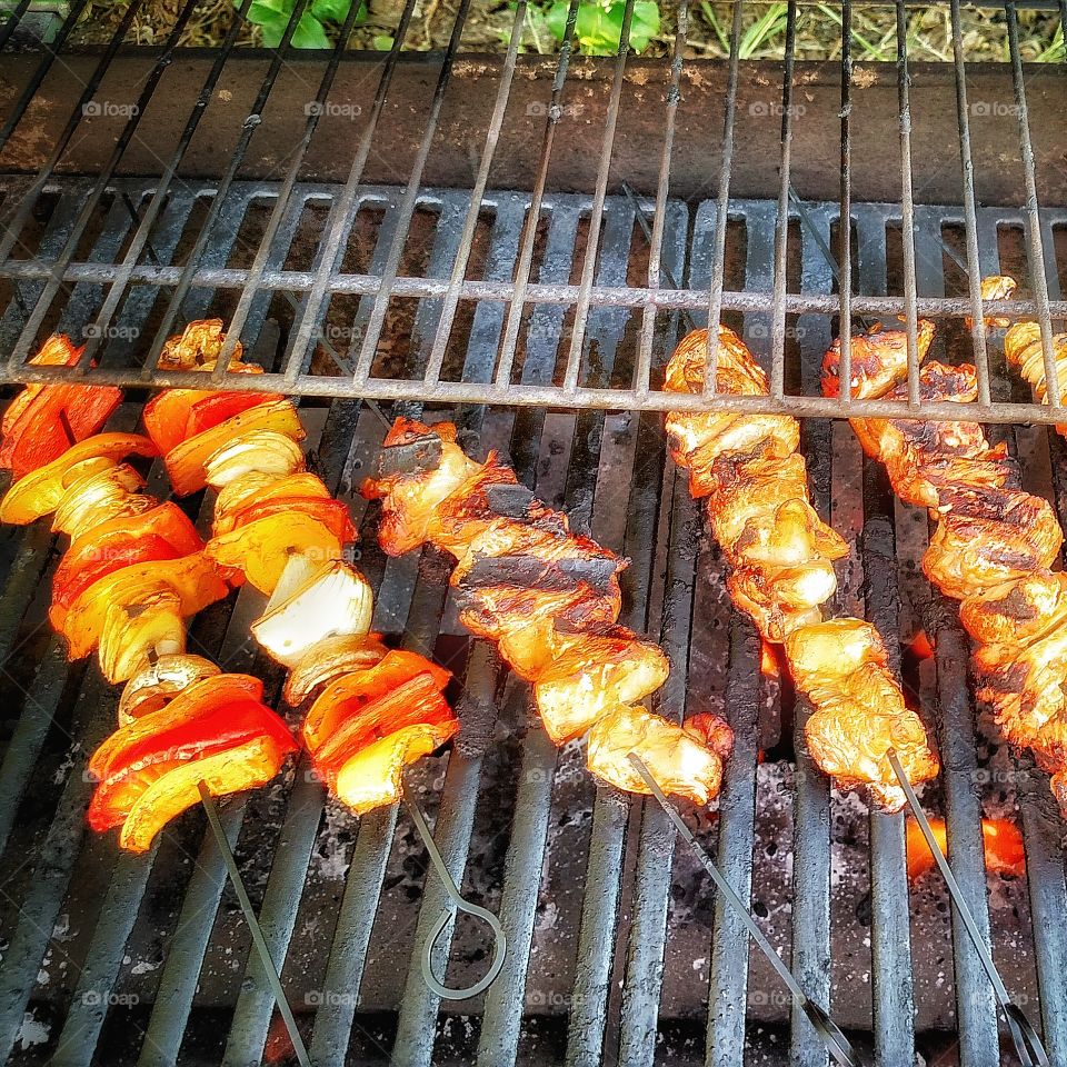 Chicken and vegetable kabobs on the grill