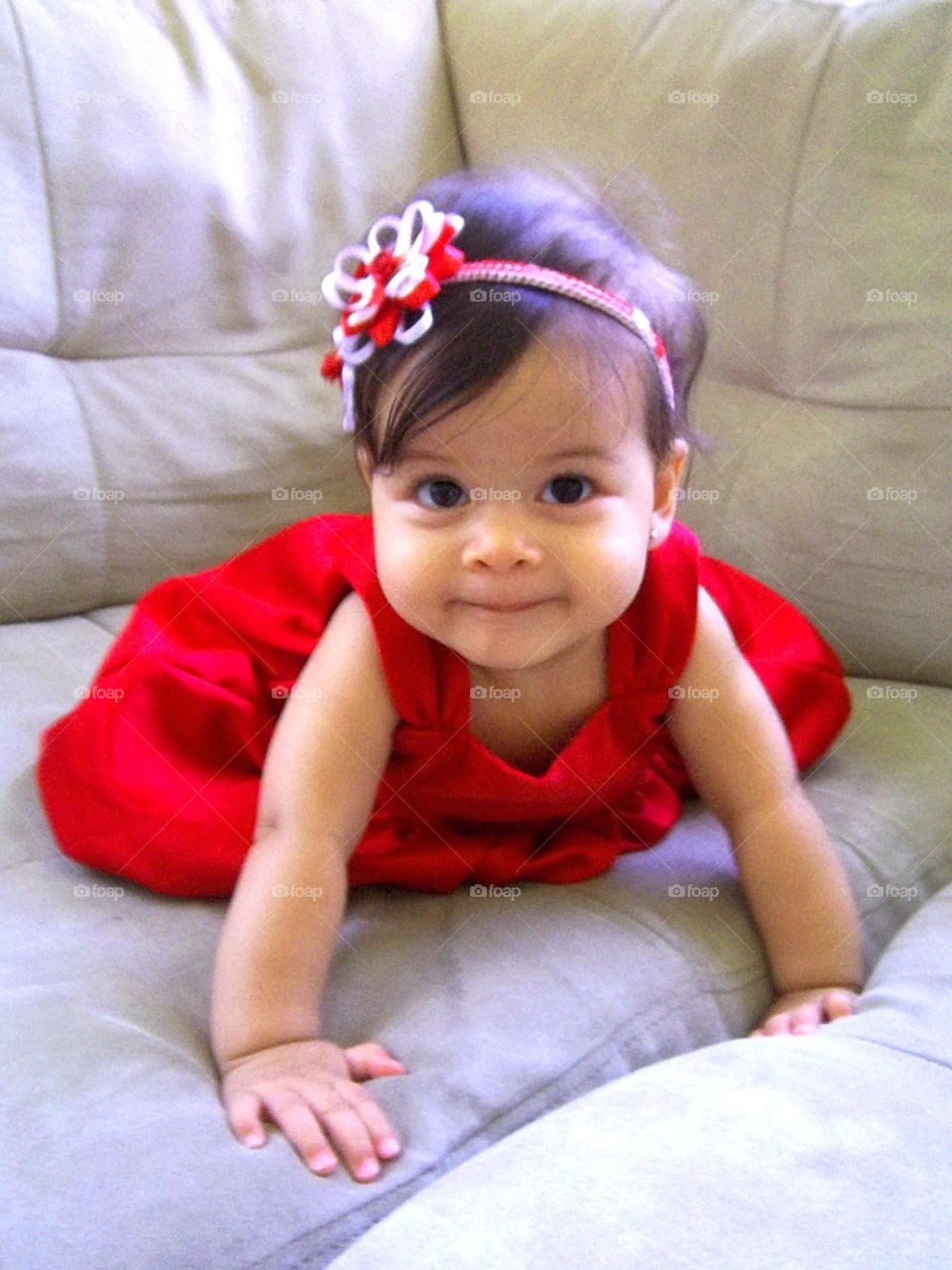 Baby girl in red dress