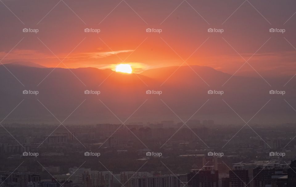 Beautiful sunset scene in Almaty Kazakhstan, view from Koctobe hill