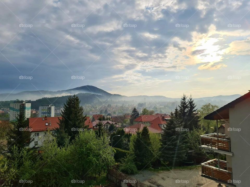 fog and sun after rain in the mountains