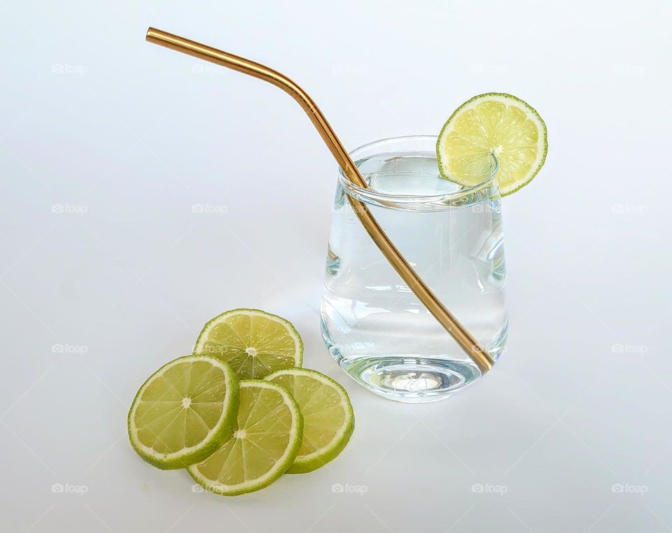 Metal straw, clear water in a glass, lime 🍋♻️🥤 Lifestyle ♻️💧✅