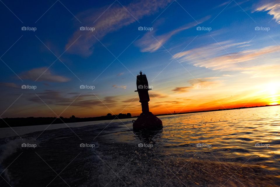 light buoy Silhouette - Sunset -
