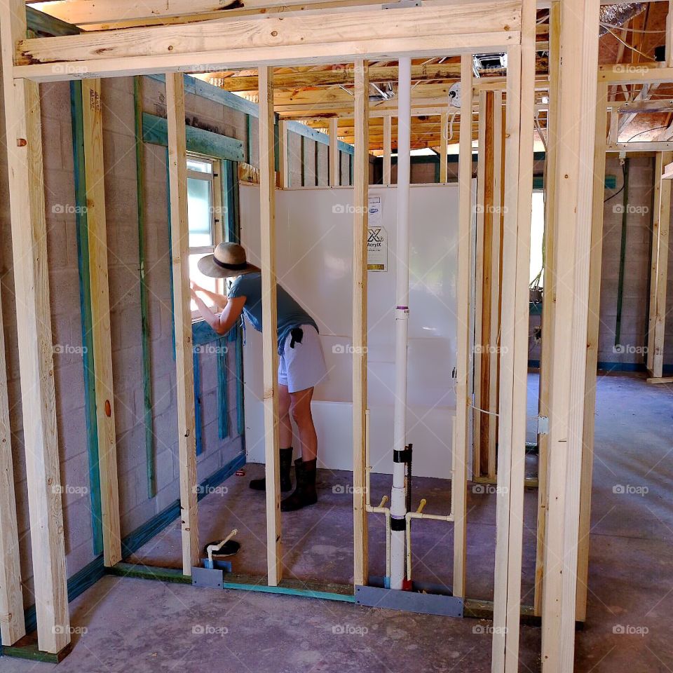 Woman exploring new construction.