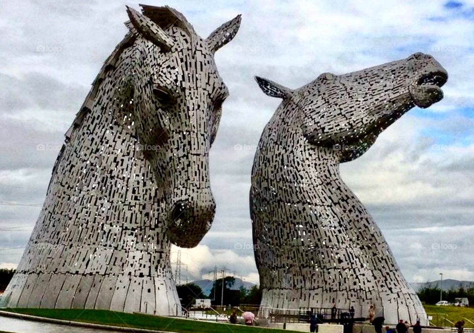 The Kelpies, 30-metre high horse head sculptures constructed in stainless steel, as a monument to horse-powered heritage in Scotland, situated at The Helix, parkland in Falkirk. 
