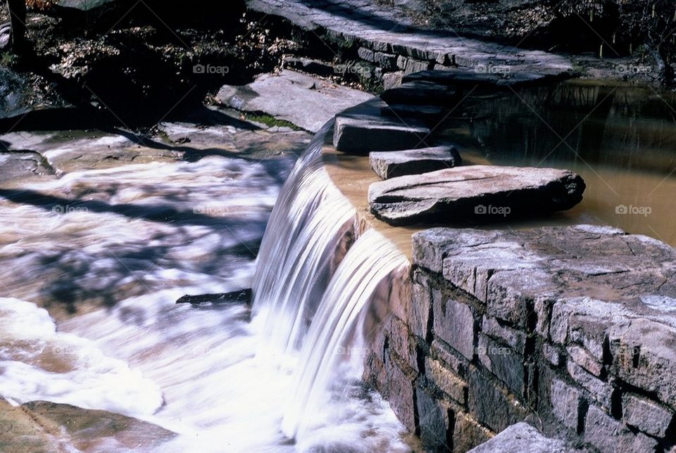 Beautiful Water fall over rocks