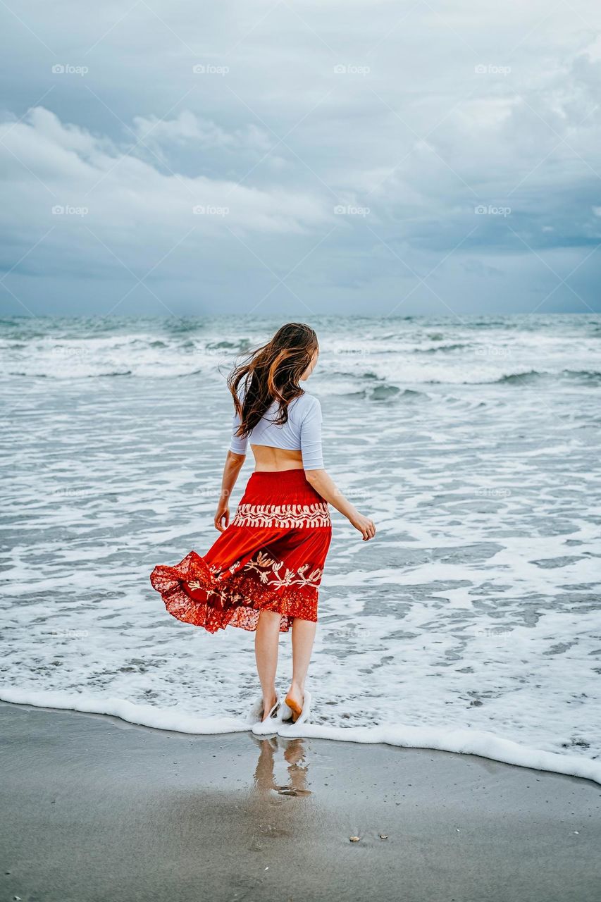 a very beautiful woman on the beach