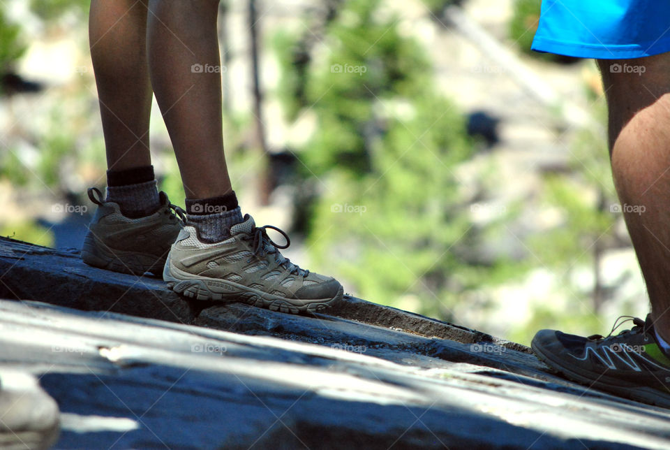 Hiking shoes, boots on top of mountain