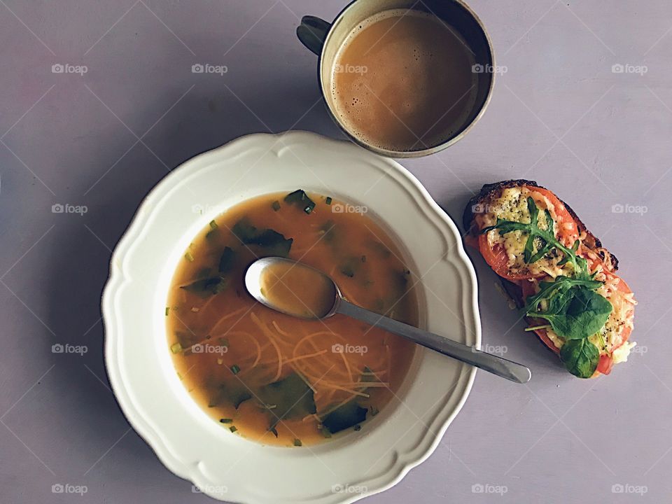 High angle view of soup and hot drink