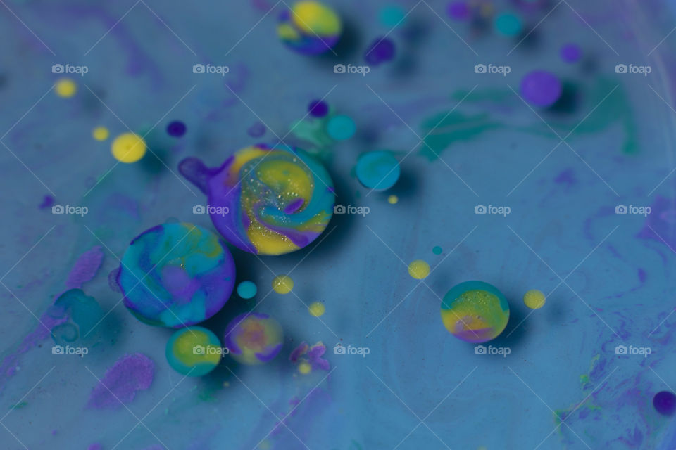 Vibrant colors in blue fluid