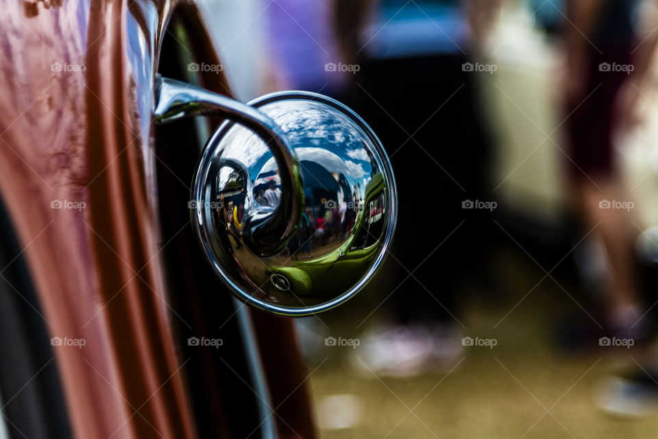 Reflexo na parte traseira de retrovisor de veículo 