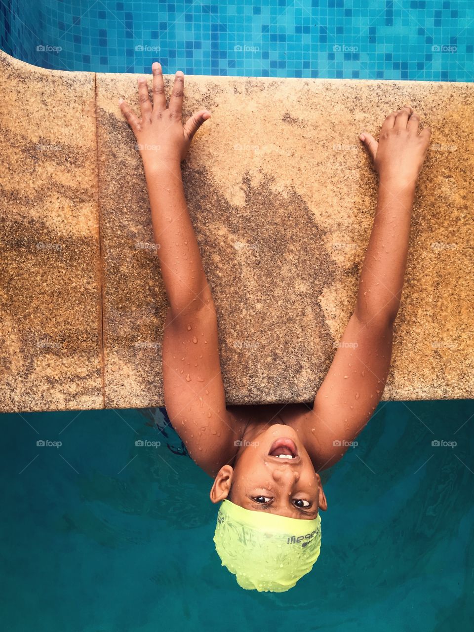 Kids from India, playing in the pool