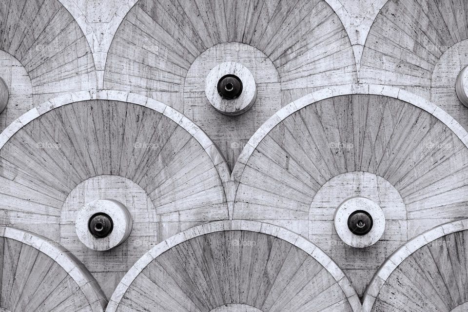 Round abstract patterns at the Cascade stairway in Yerevan, Armenia constructed during the Soviet era between 1971 and 1980.