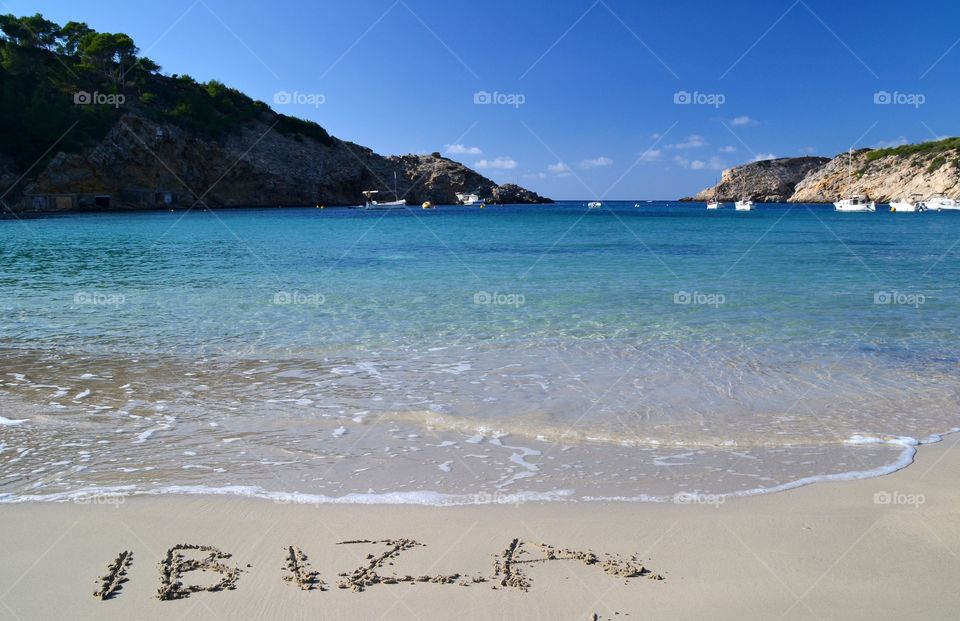 The word Ibiza in the sand. The word Ibiza written in the sand in Cala Vadella, Ibiza - Spain