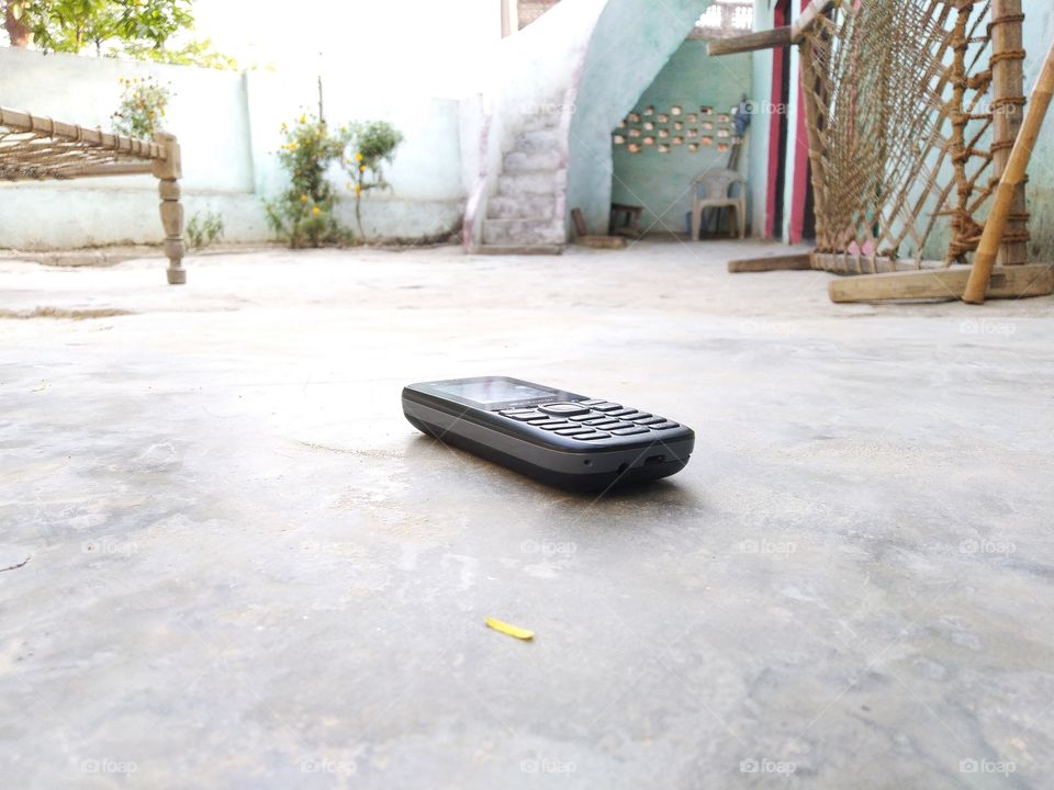 mobile phone on ground