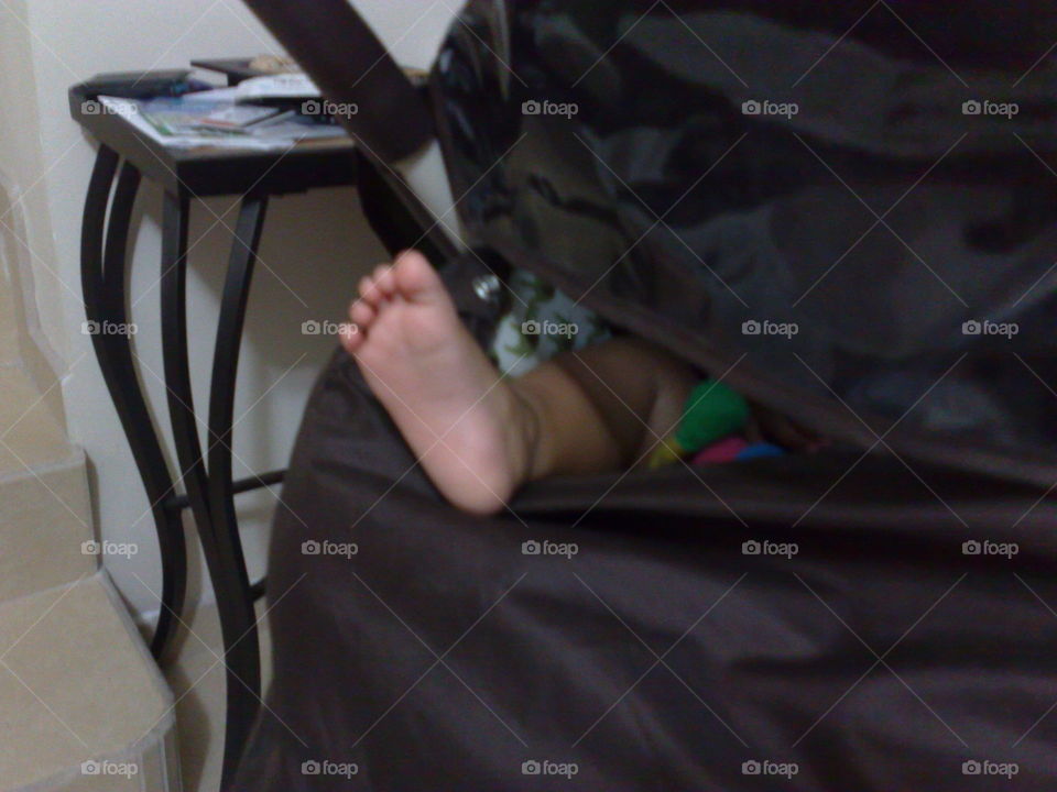 Baby's foot.. My daughter sleeping in stroller.