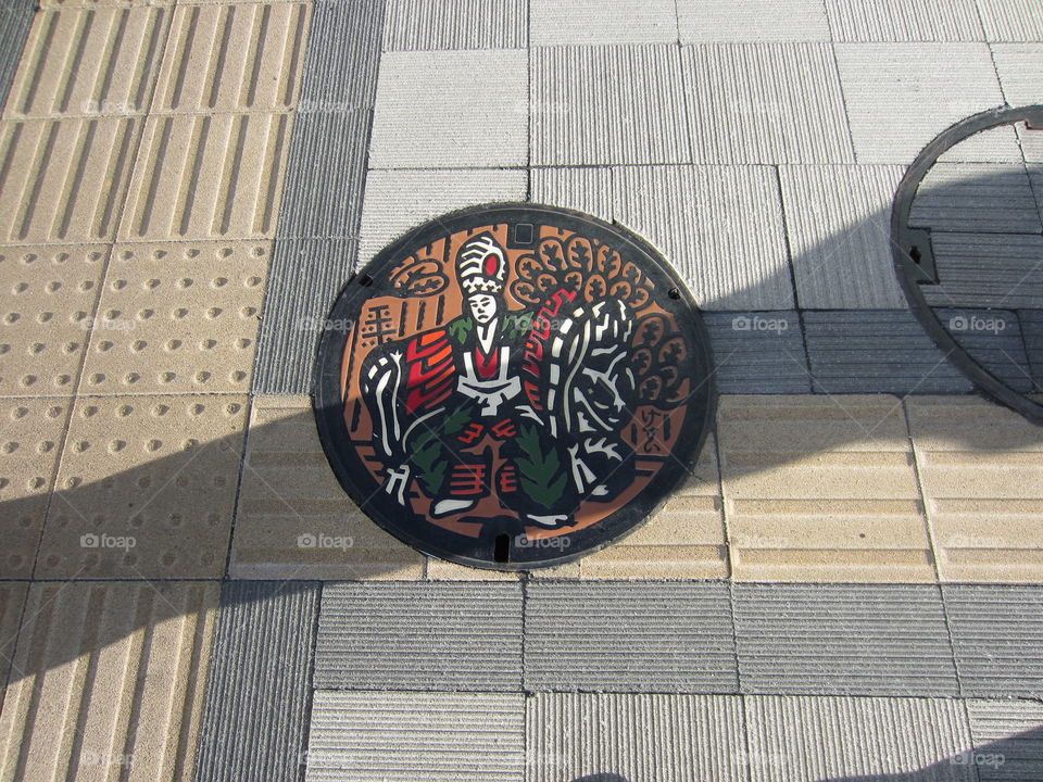 Hachiouji, Tokyo, Japan.  Colorful Sewer Manhole Cover Art.