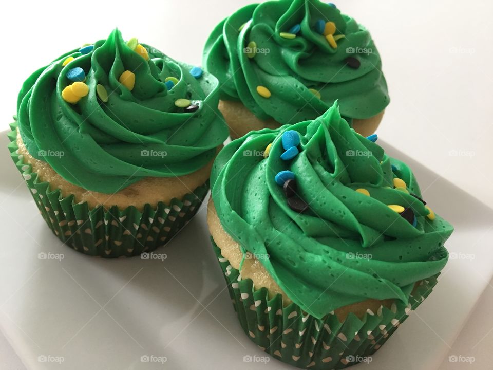 White Cupcakes with Green Buttercream Frosting 