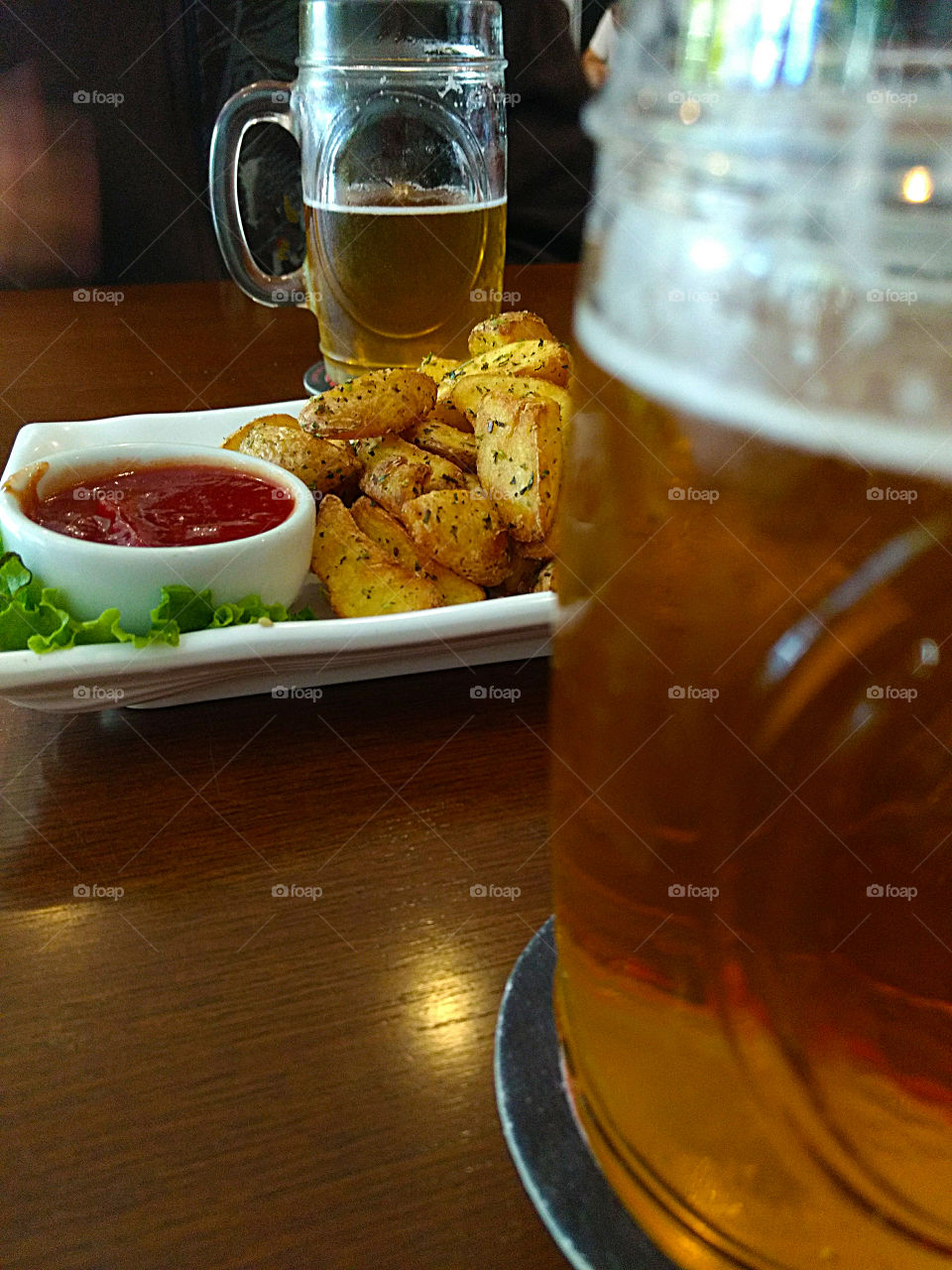 Cold beer and potato wedges