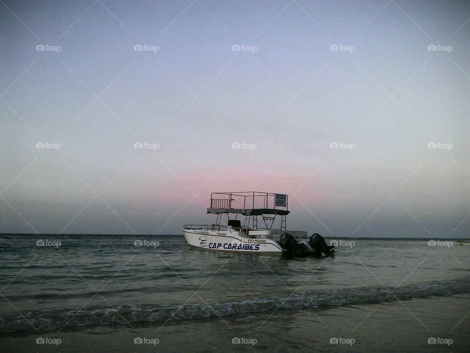caribbian tour boat. tour boat in caribbian sunset sea