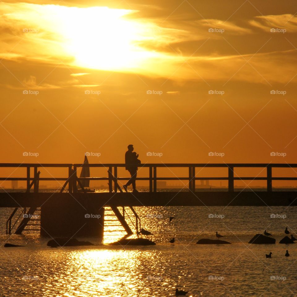 Silhouette on a jetty