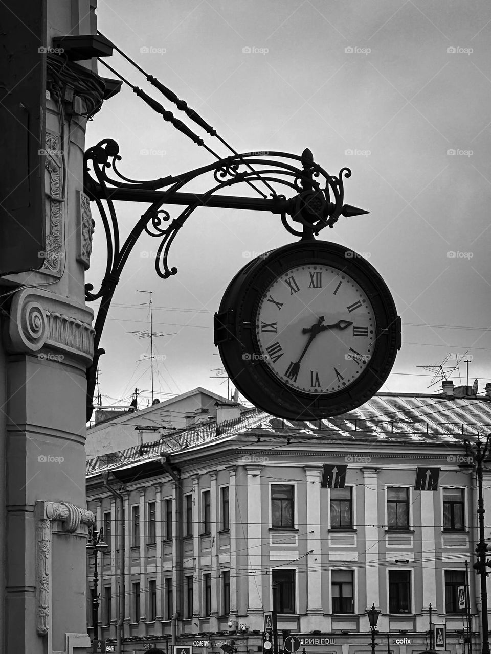Urban architecture black and white photo. City clock 