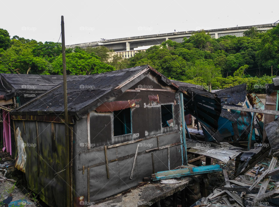 Abandoned stilt houses in the evicted fishermen village on Ma Wan Island, Hong Kong