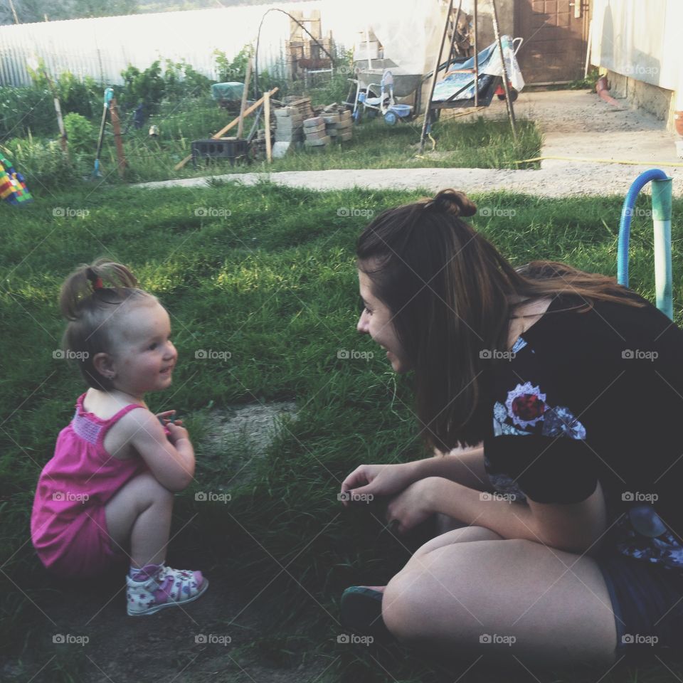 Mother and daughter enjoying in park